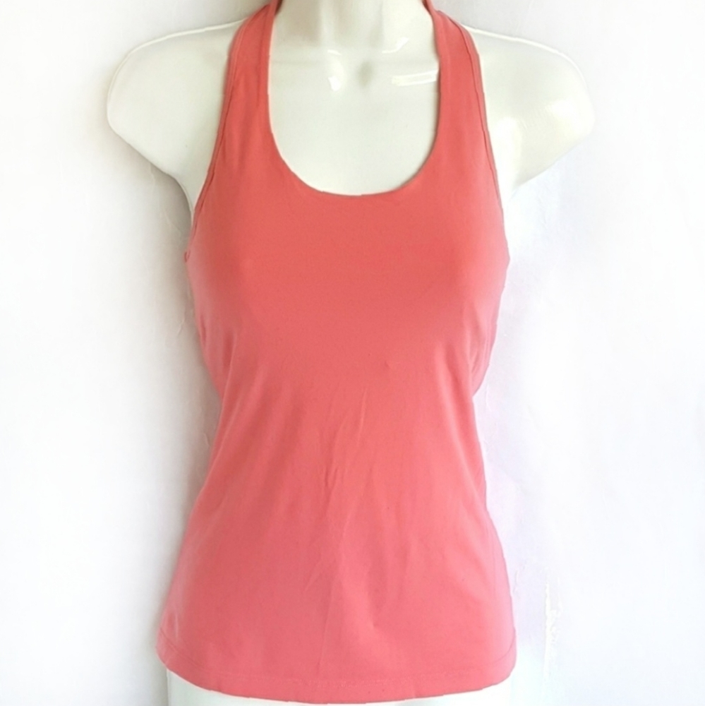 Lucy women's tank top, size medium, coral tone.